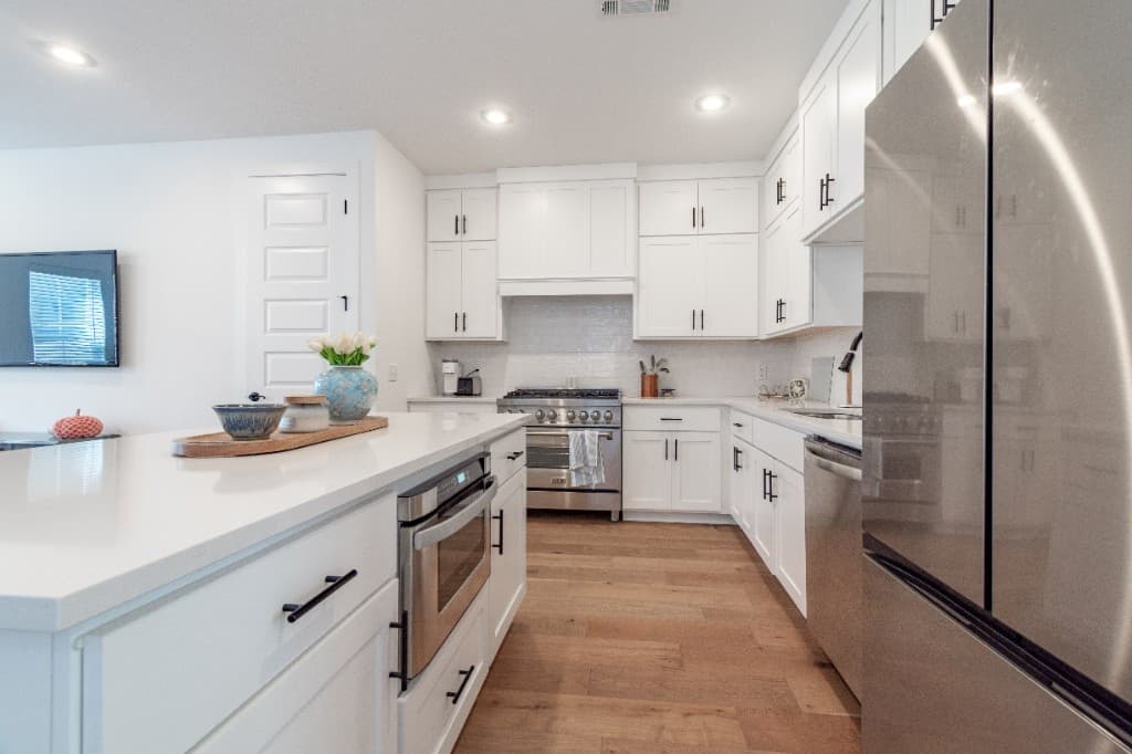 Deans Row Avenue — kitchen with island and range